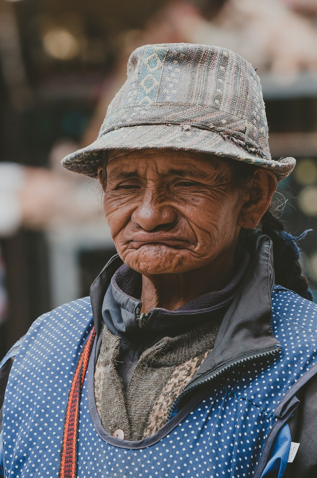 Close up portrait of an elderly Chilean street vendor smiling